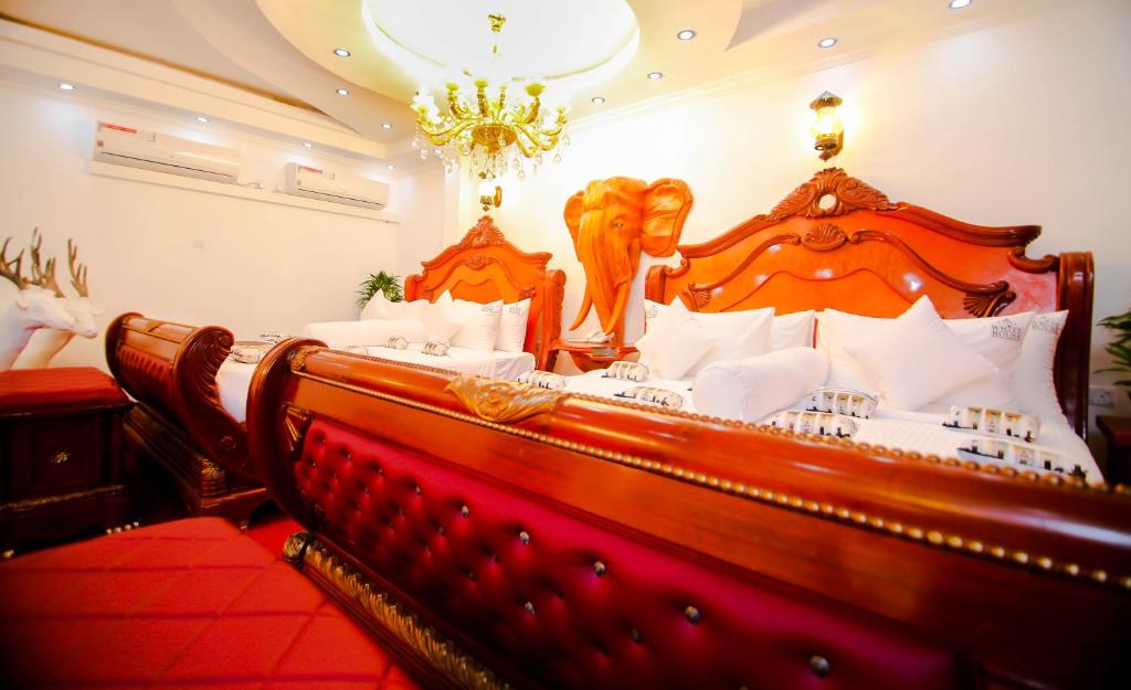 Postel nebo postele na pokoji v ubytování Hotel White House
