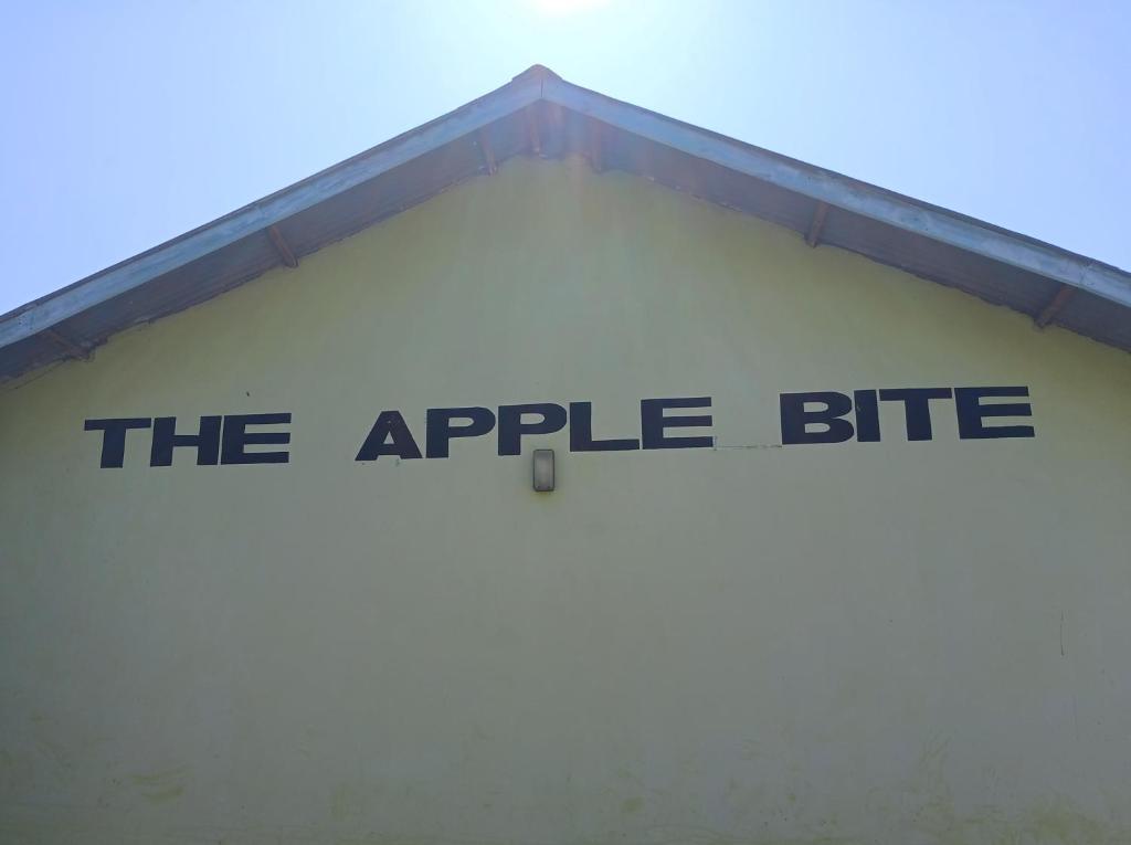 an apple bite sign on the side of a building at The Apple Bite in Malindi
