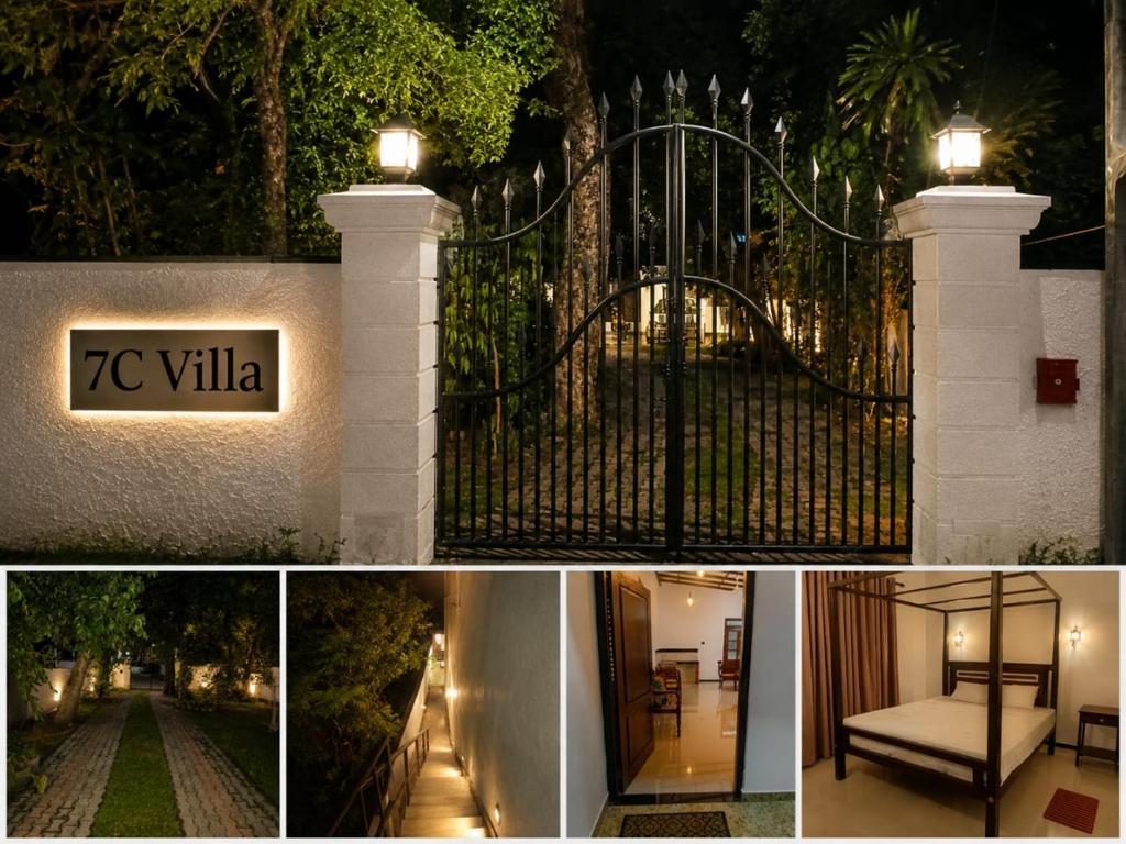 a gate to a house with a sign on it at 7C Villa in Galle