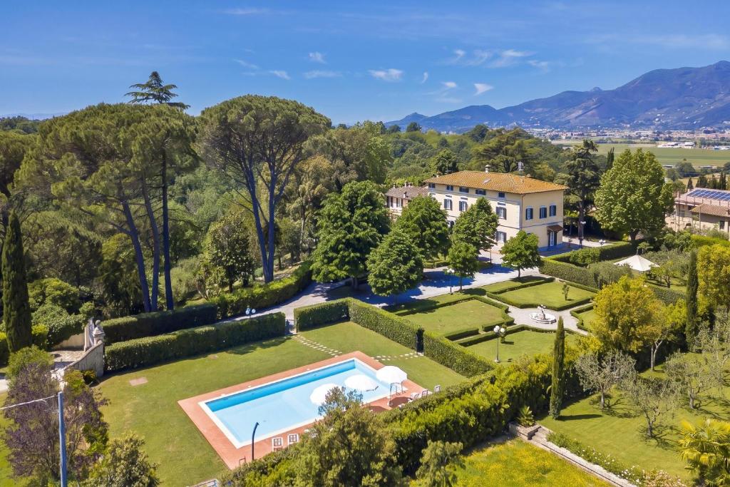an aerial view of a house with a swimming pool at Tenuta Santa Colomba - Happy Rentals in Bientina