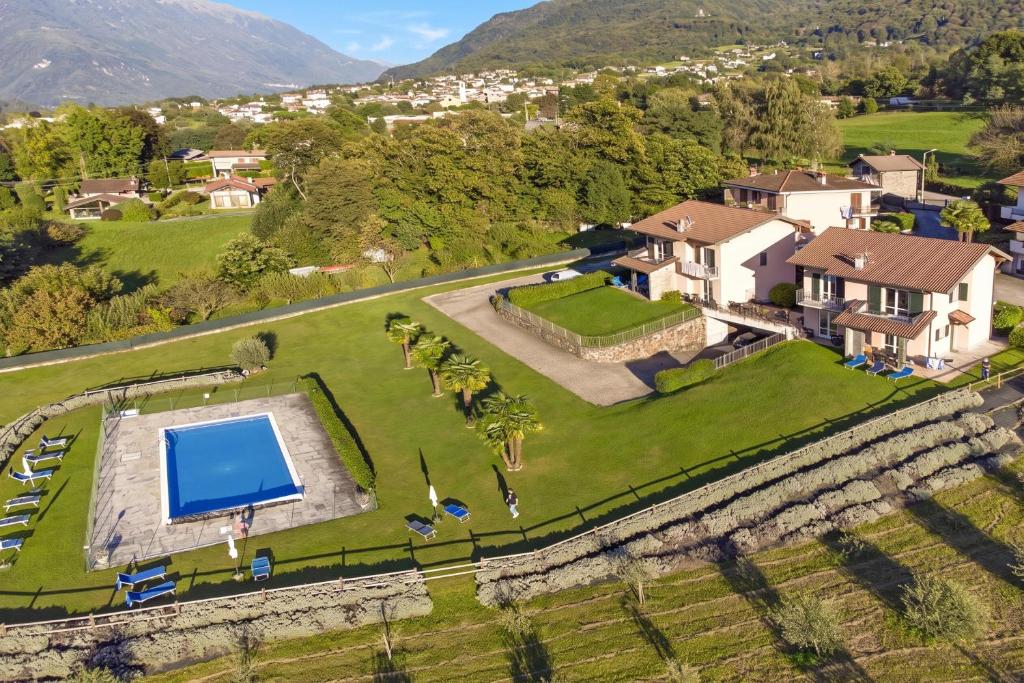 an aerial view of a villa with a swimming pool at Iris in Colico