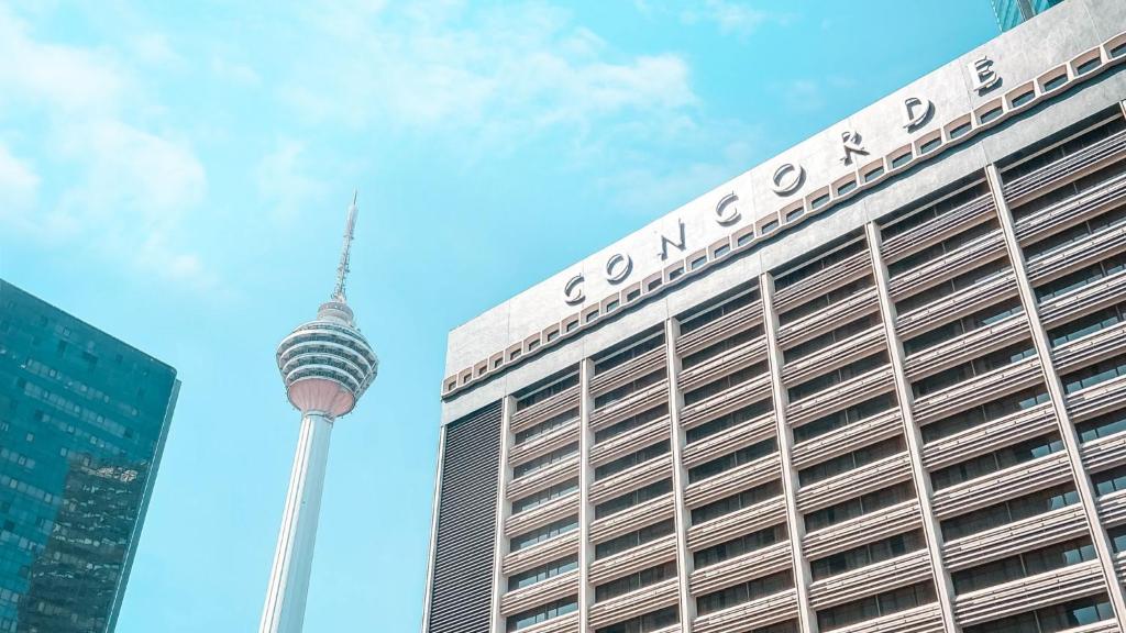 a view of a building with the oriental pearl tv tower at Concorde Hotel Kuala Lumpur in Kuala Lumpur