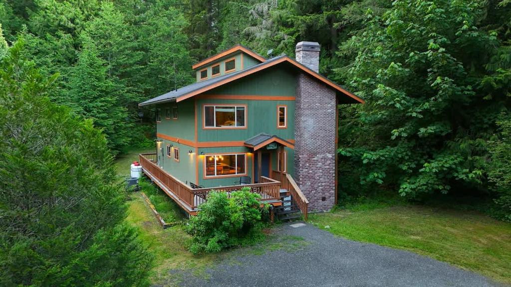 an aerial view of a house in the woods at Silver Peak Lodge in Glacier
