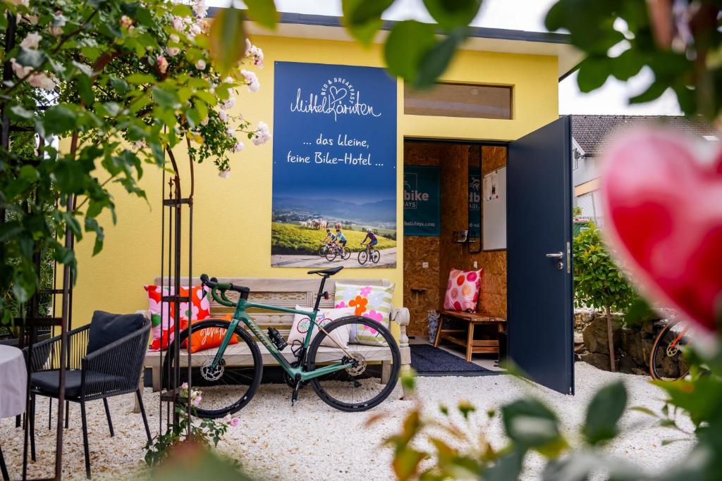 a bike parked in front of a building at Bed and Breakfast Mittelkärnten in Althofen