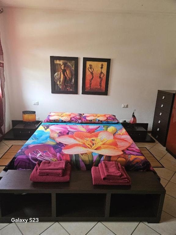 a bedroom with a bed with blankets on it at Apartment with three double bedrooms in Altavilla Vicentina