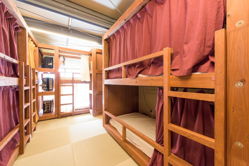A bunk bed or bunk beds in a room at GrapeHouse Koenji