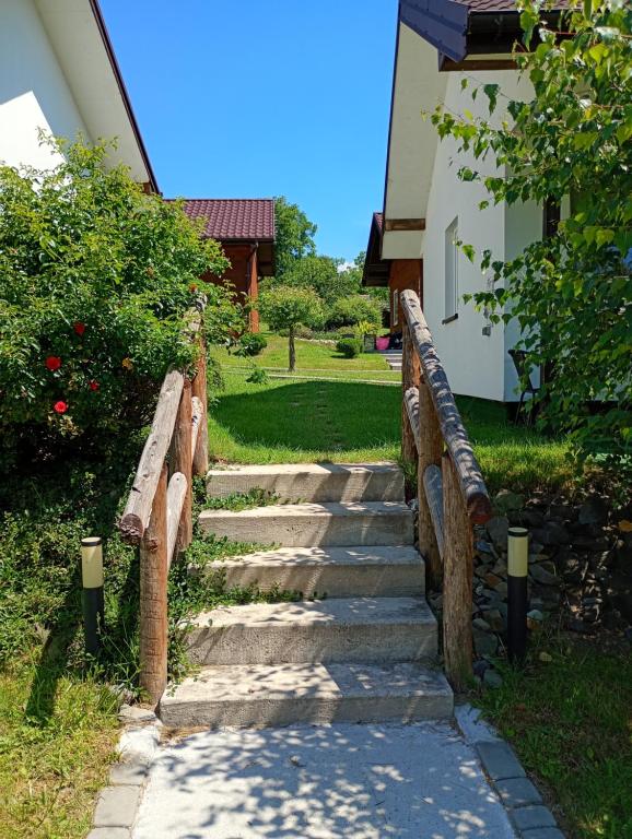 a set of stone stairs leading to a house at Idylla in Połom Mały