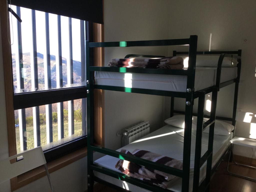 Palanda nebo palandy na pokoji v ubytování Linar Do Rei