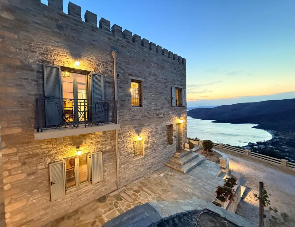 a building with a view of the water at Agnandio Retreat Euboea in Animborió