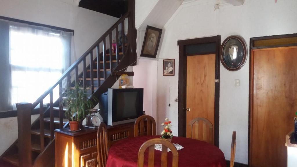 TV a/nebo společenská místnost v ubytování Hostal Cotroneo