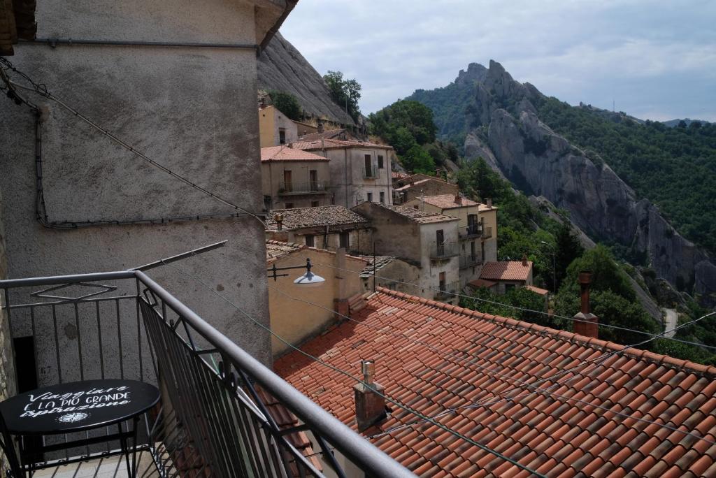 a view of a town from the balcony of a building at Bruner Haus - Casa Vacanze in Castelmezzano