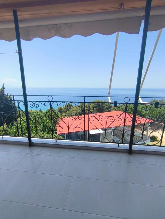 a view of the ocean from a balcony at Paradisos in Loutsa