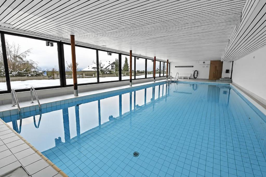 Studio cosy avec piscine intérieure - vue montagne
