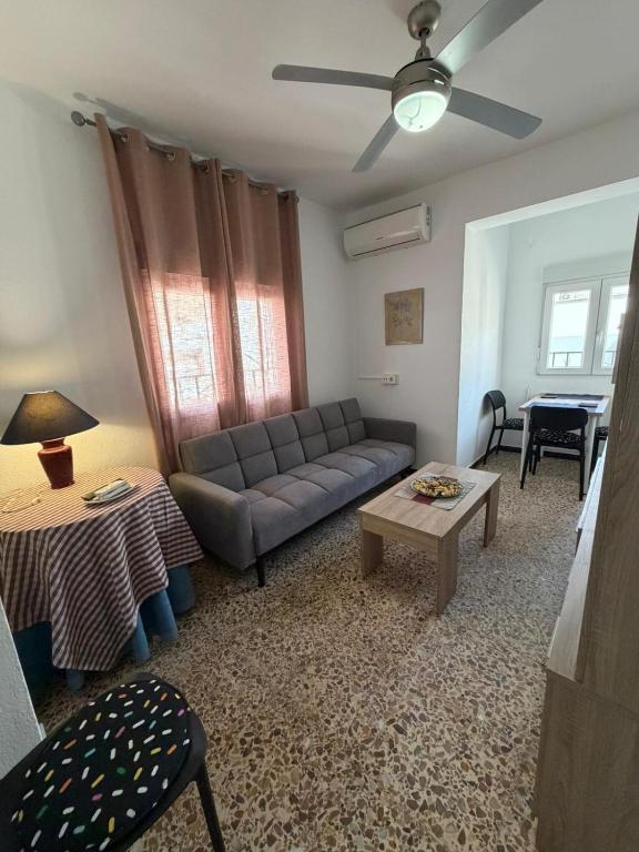 a living room with a couch and a table at Hospederia Ortiz 2 in Níjar