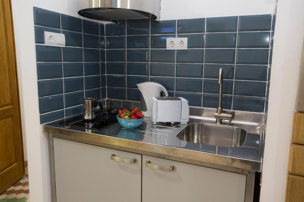 Kuchyň nebo kuchyňský kout v ubytování Eco-Friendly Apartments