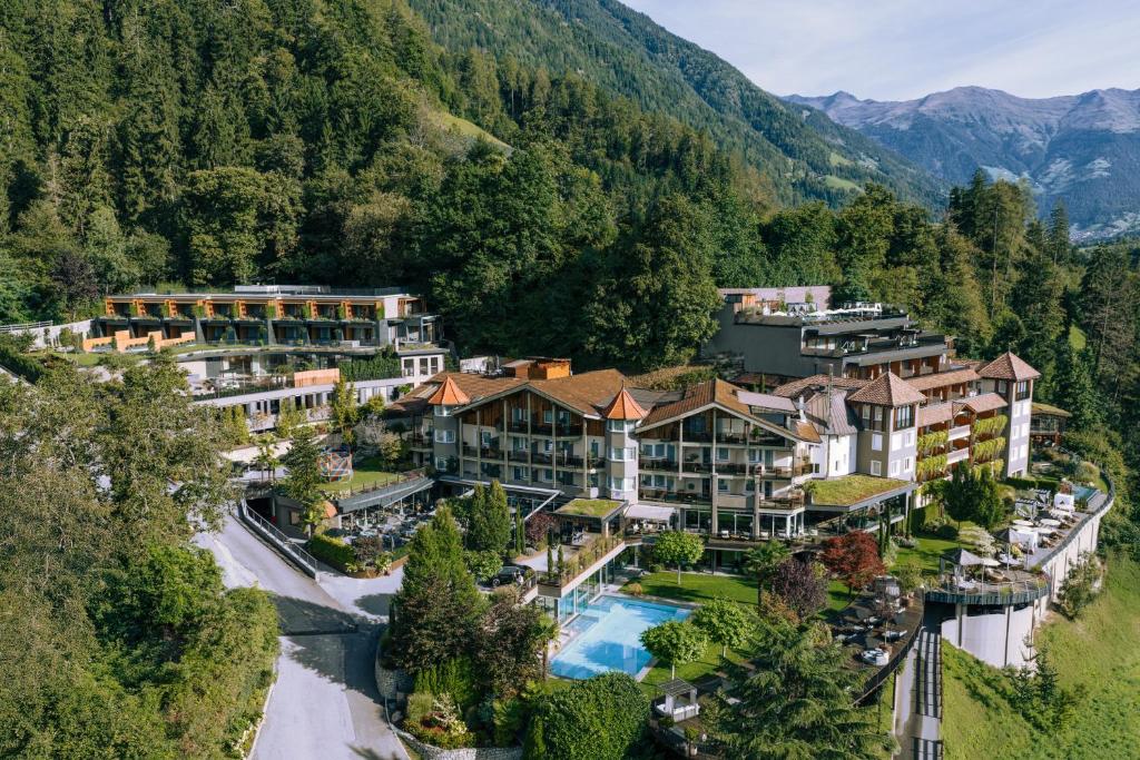 an aerial view of a resort in the mountains at Hotel Chalet Das Alpenschlössel in Saltusio