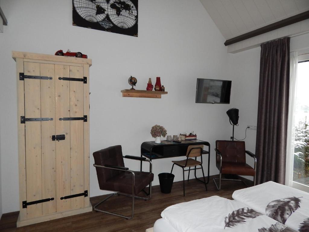 TV a/nebo společenská místnost v ubytování B&B Johannesberg