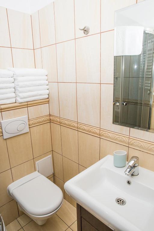 Kúpeľňa v ubytovaní Dom Wakacyjny Mistral