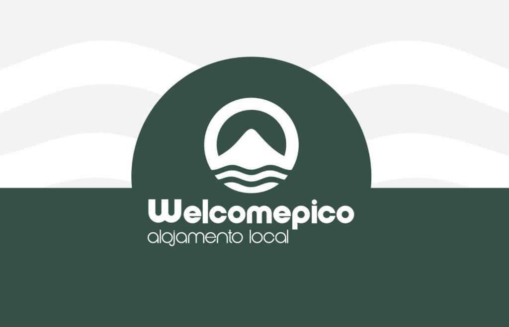 a logo for the welcomevisor automatic food website at Welcome Pico in Madalena