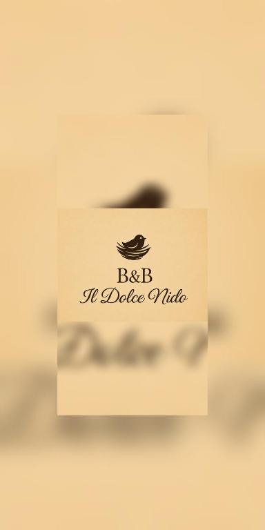 a box with a picture of a bird on it at B&B Il Dolce Nido in Tortora