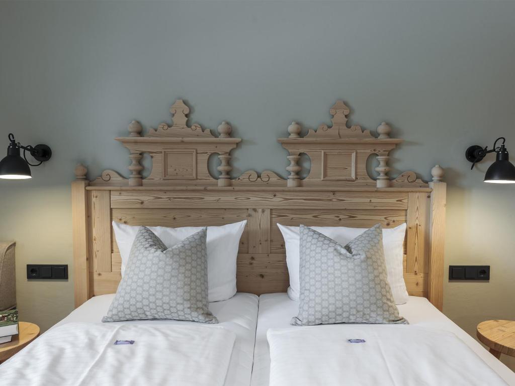 En eller flere senge i et værelse på Forstnerwirt hotel | stubn | biergarten