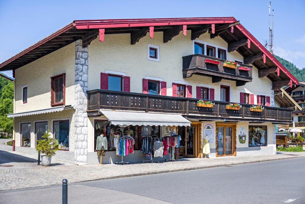 a store on the side of a building at Ferienwohnung Sophie in Ruhpolding