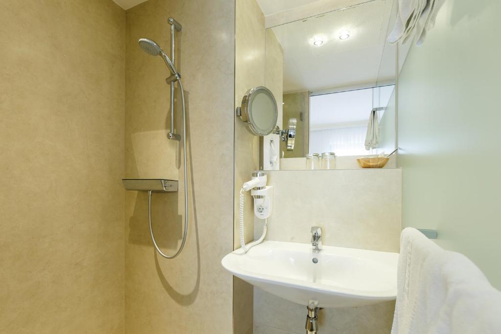 Kúpeľňa v ubytovaní Das-Schmidt Privathotel