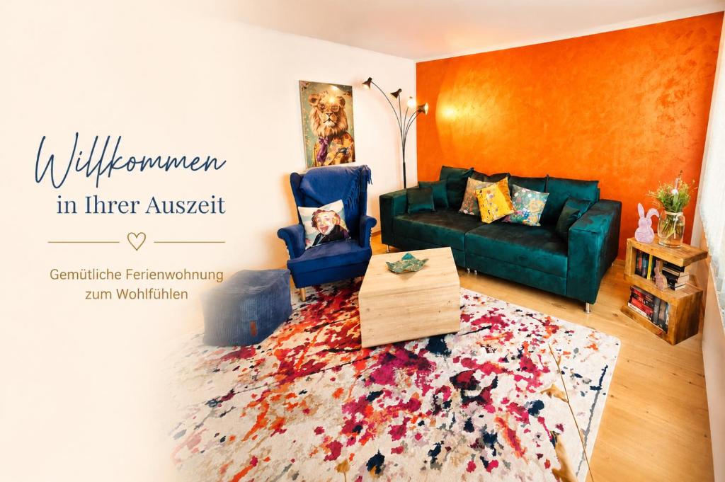 a living room with a couch and a rug at Lange Hans Rennsteig in Oberschönau