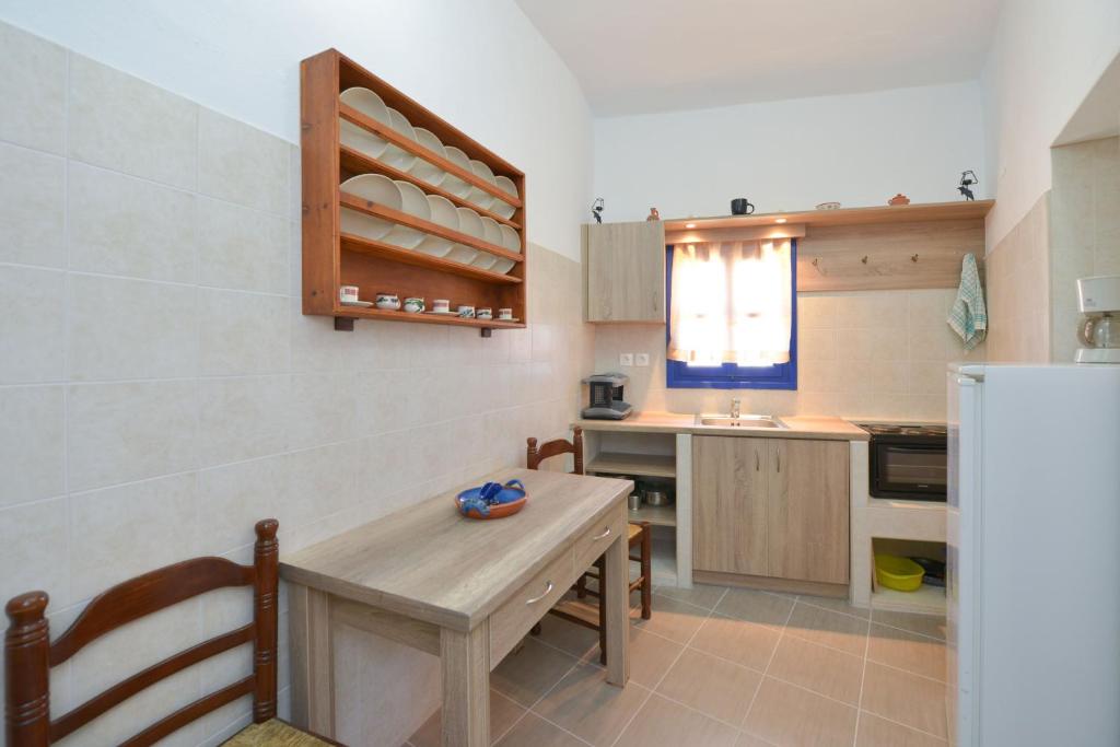 Kuchyň nebo kuchyňský kout v ubytování Windmill Villas