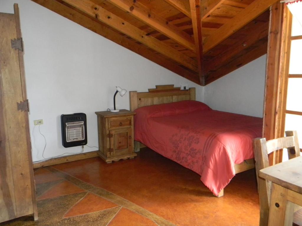 Postel nebo postele na pokoji v ubytování La Troje de Adobe