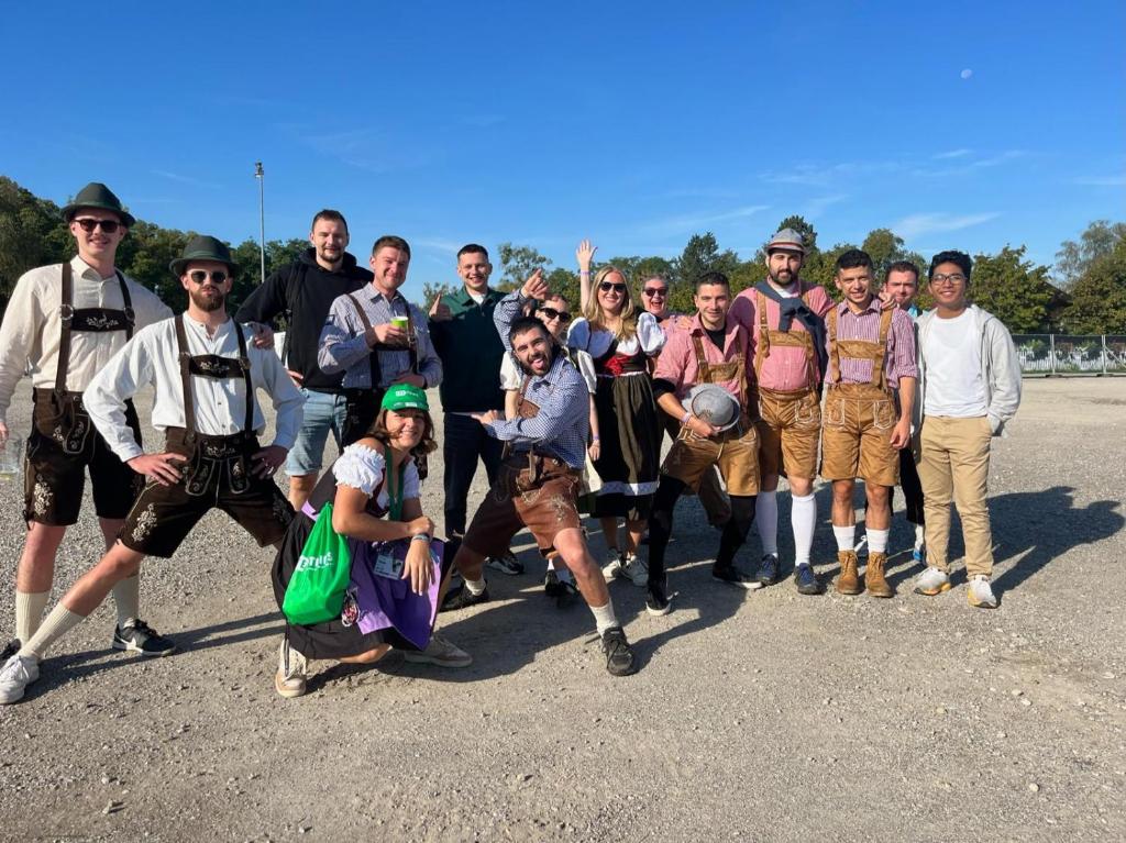 a group of people posing for a picture in a parking lot at Munich Oktoberfest Village Breakfast included by Yes-Trips! in Munich