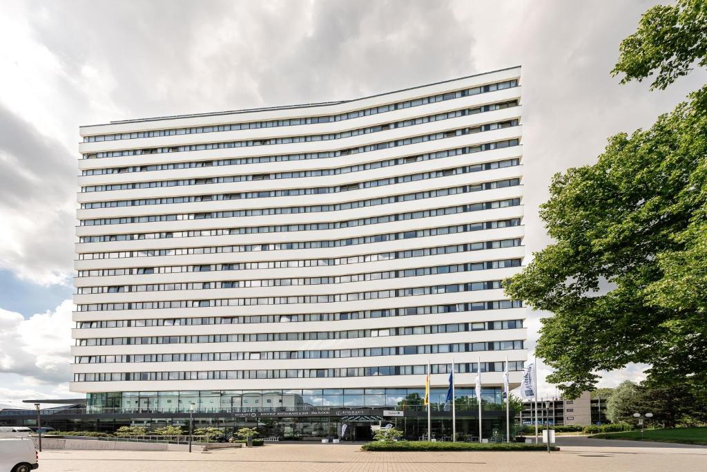 a large office building with a lot of windows at Radisson Blu Hotel, Bonn in Bonn