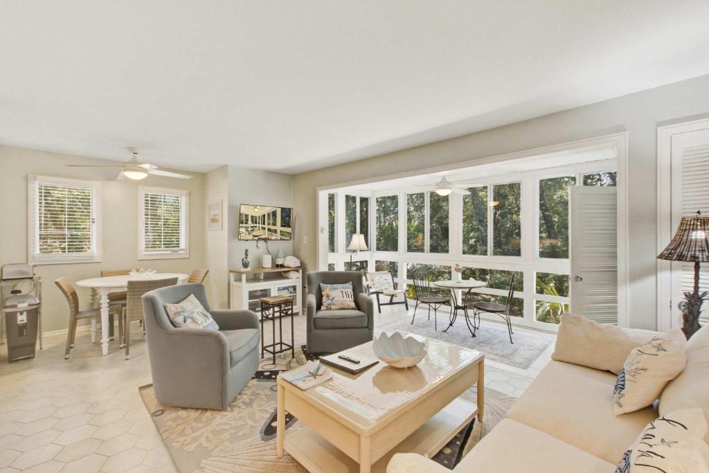 a living room with a couch and a table at Seascape 3522 in Kiawah Island