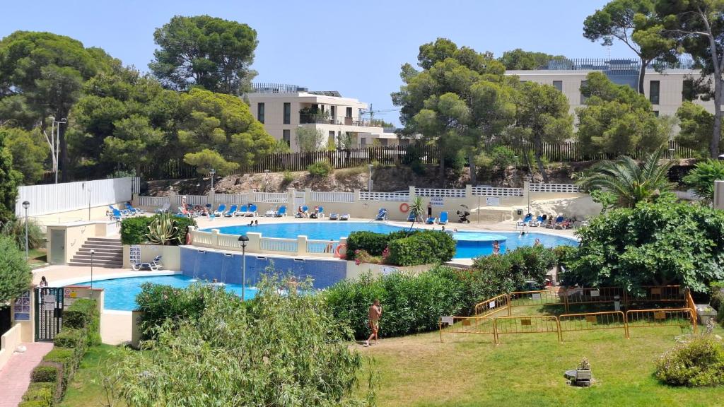 a view of the pool at a resort at Salou Beach Apartment with private Pool in Salou