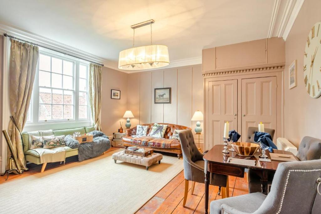 a living room with a couch and a table at 1 Bed in Elstronwick oc-e42580 in Burton Pidsea
