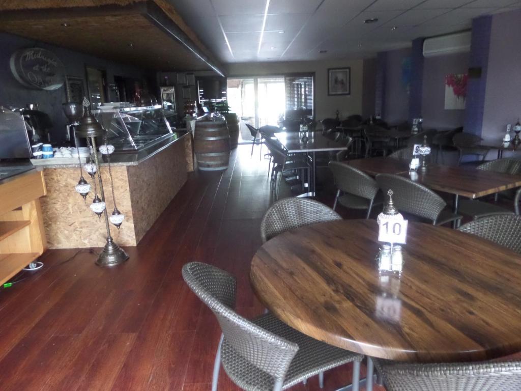 Kuchyň nebo kuchyňský kout v ubytování Motel Oasis