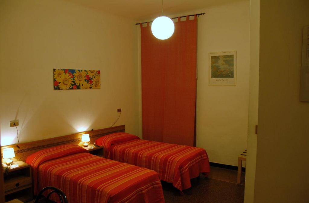 Postel nebo postele na pokoji v ubytování Hotel Major