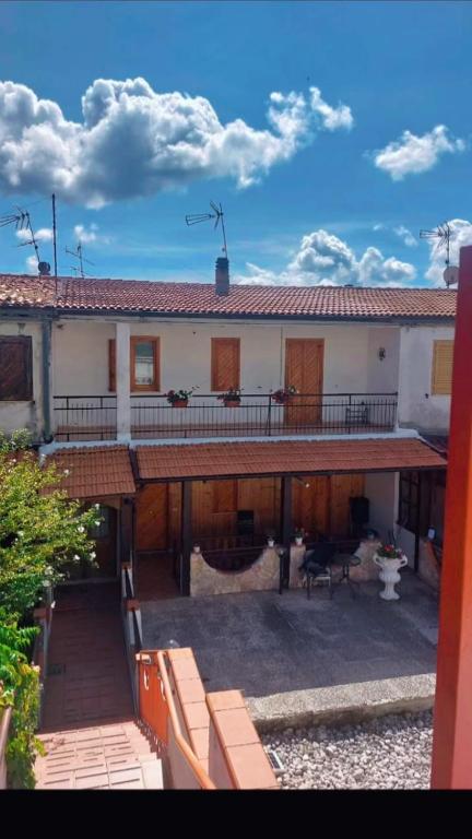 a large house with a balcony and a patio at Da Ross in Castel di Sangro
