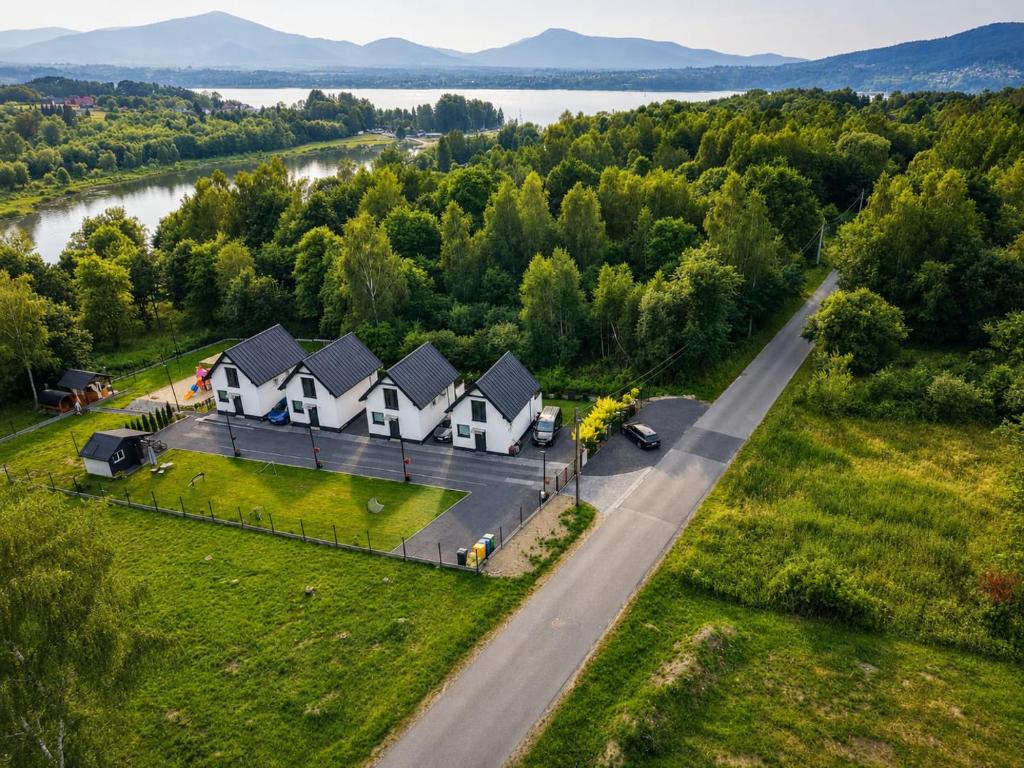 an aerial view of a row of houses on a road at VeloDomki Żywiec - domki nad Jeziorem Żywieckim in Żywiec