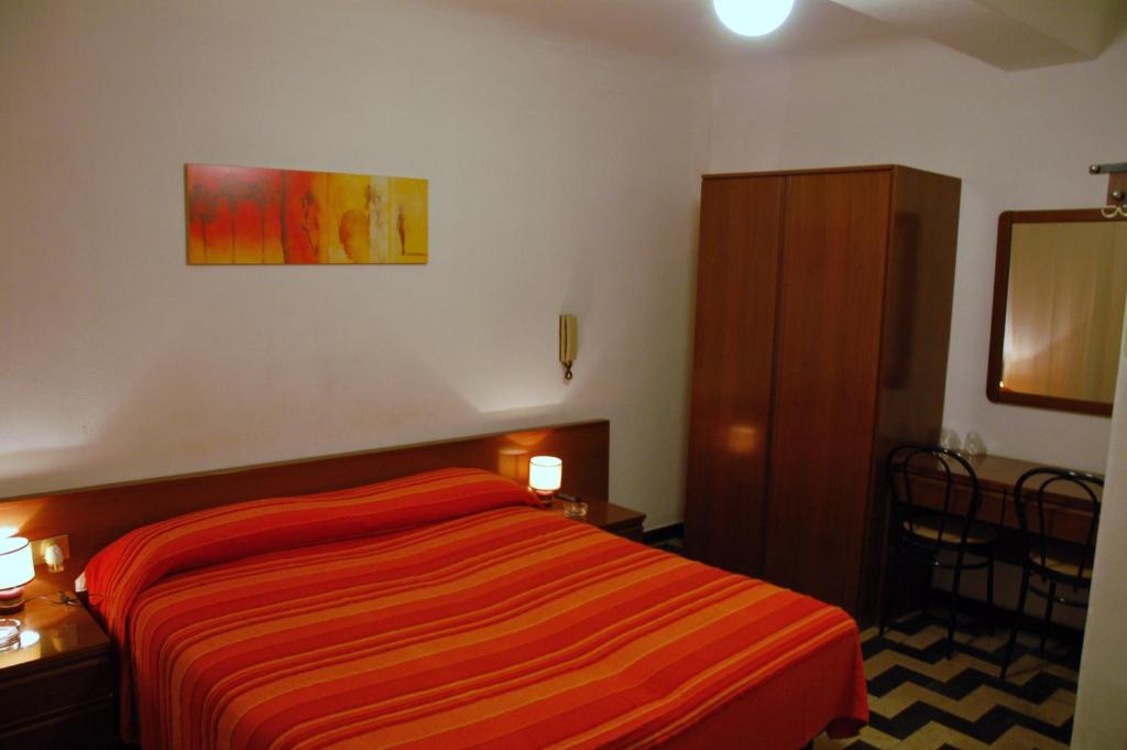 Postel nebo postele na pokoji v ubytování Hotel Major