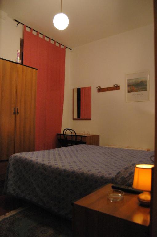 Postel nebo postele na pokoji v ubytování Hotel Major
