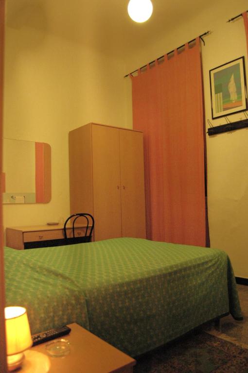 Postel nebo postele na pokoji v ubytování Hotel Major