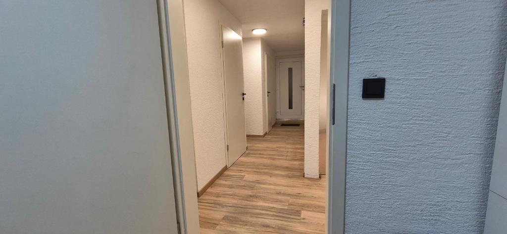a hallway with a hallway leading into a room at COMFY Gemütliche Unterkunft 013 in Ditzingen