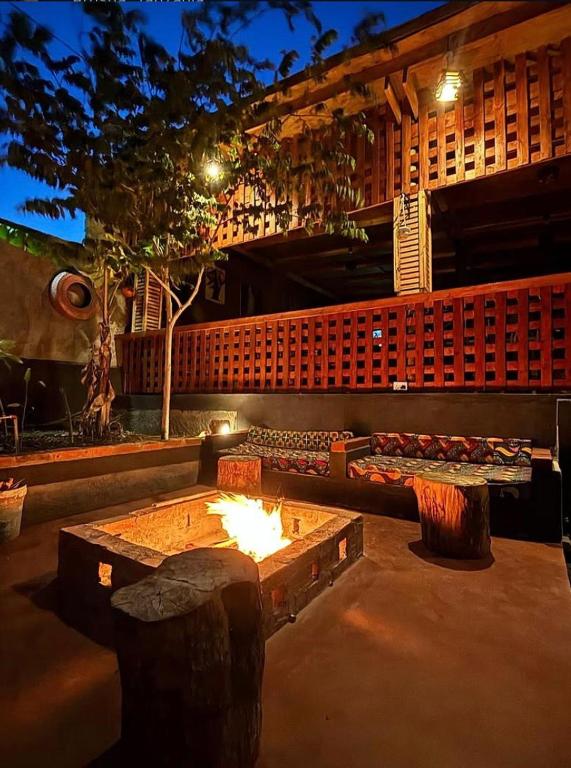 a fire pit in the middle of a patio at Balletto Boutique in Arusha