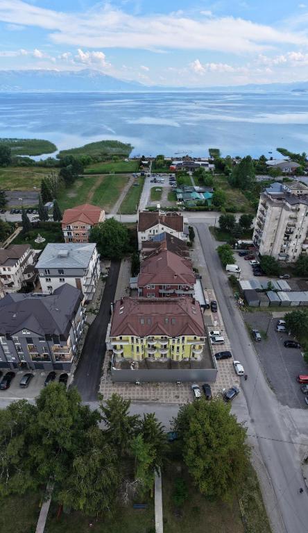 an aerial view of a city with the ocean at Vala Rooms in Struga