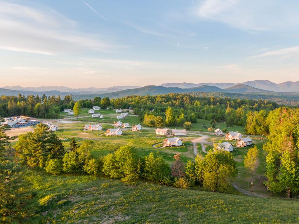an aerial view of a village in the mountains at Under Canvas White Mountains in Dalton