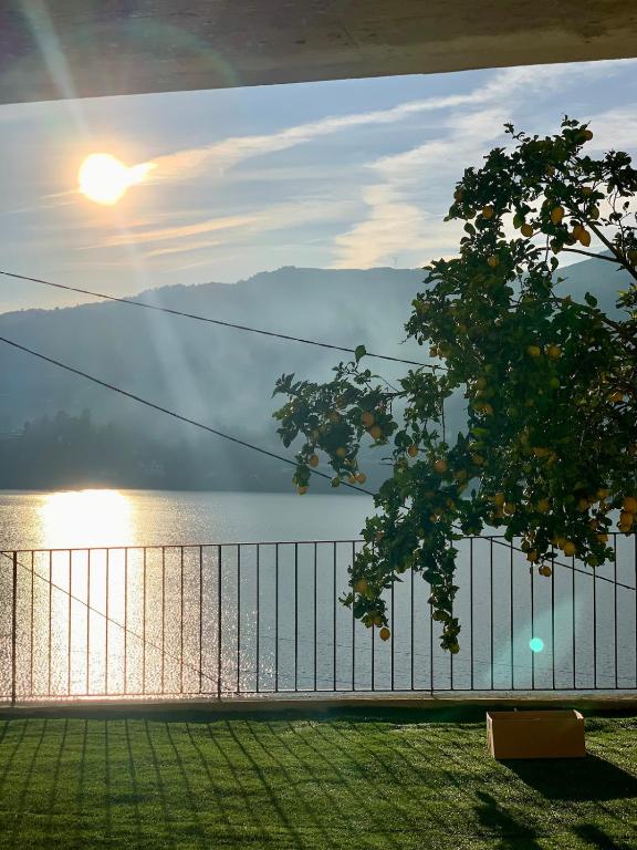 a view of a body of water with a fence at Casa Miralago - Gerês in Admeus