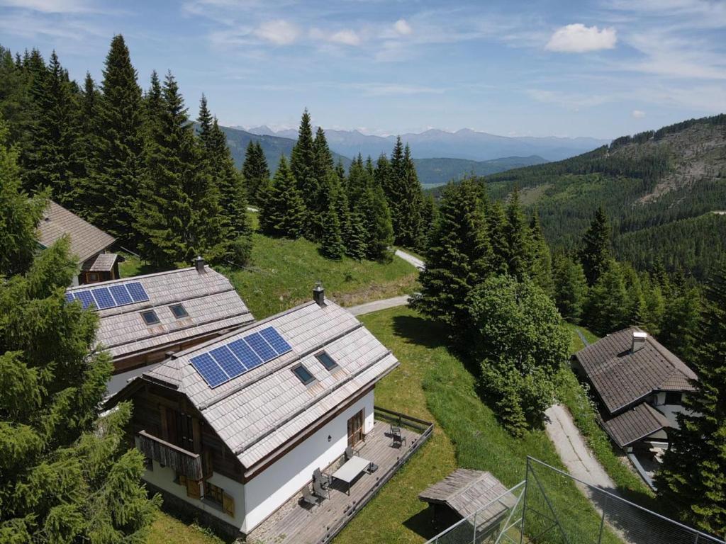 an aerial view of a house with solar panels on its roof at Chalet Petra in Katschberghöhe