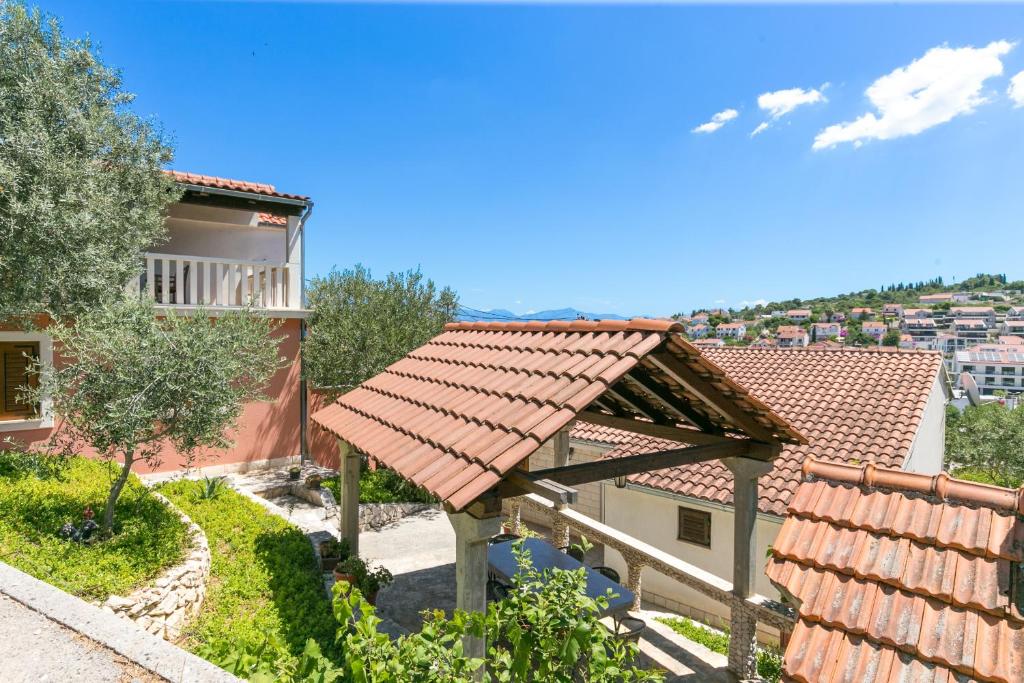 a view of a house with a roof at Apartments with parking space Sutivan, Brac - 2846 in Sutivan