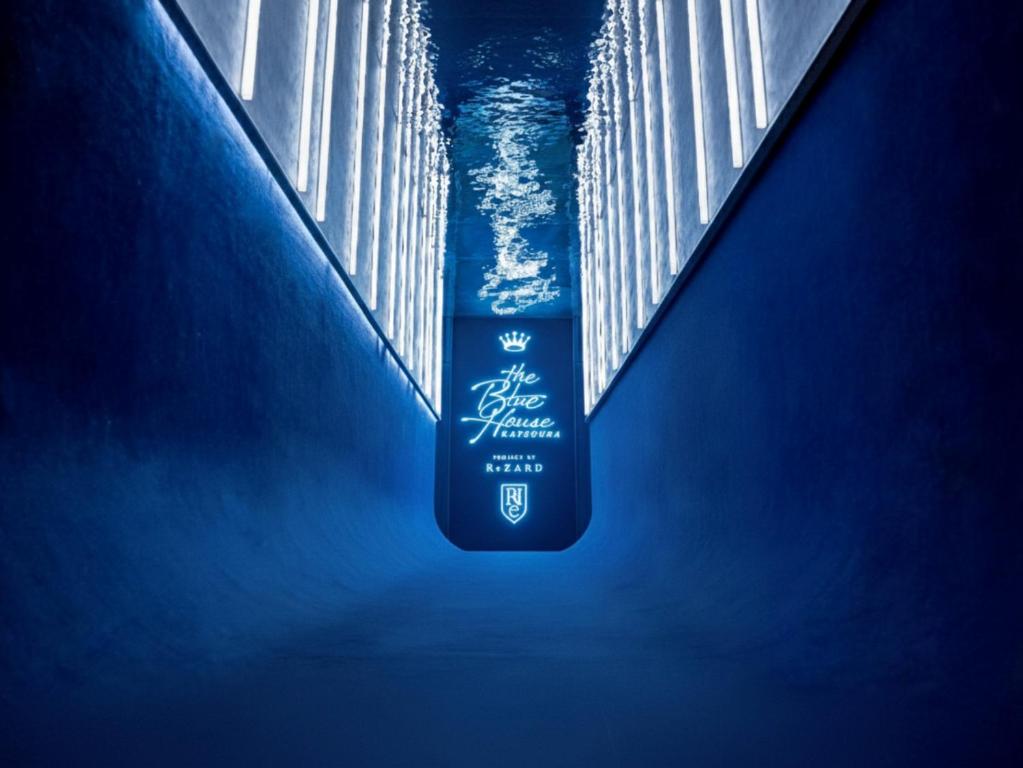 a bottle of water in a swimming pool at The Blue House in Katsuura